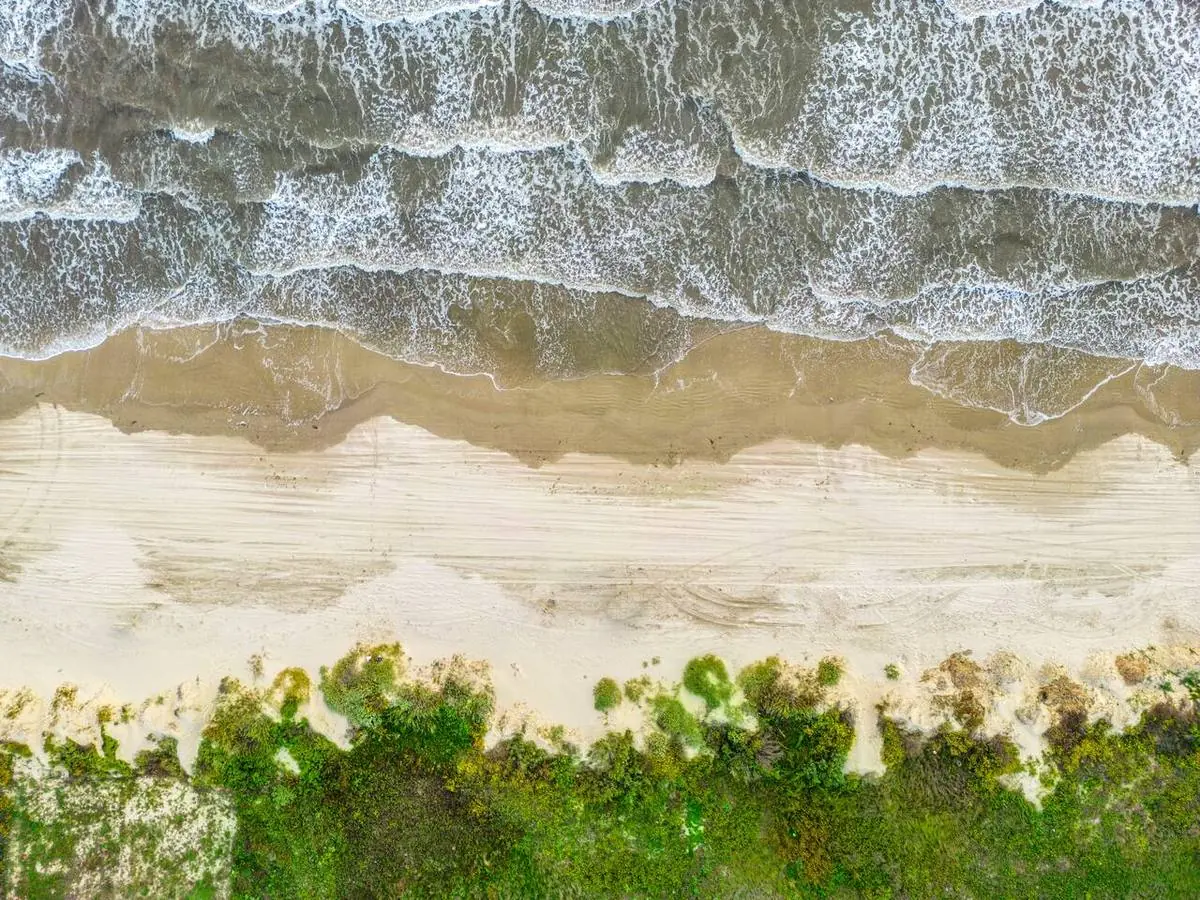 Aerial view of the beach near the house in Crystal Beach