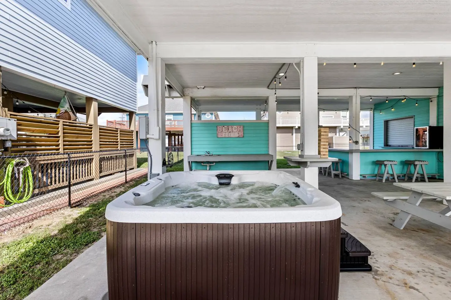 Hot tub under the covered patio